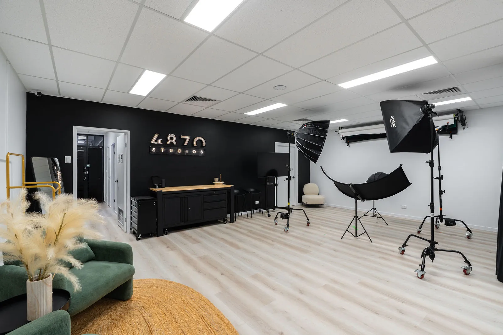Inside the 4870 content studio with lighting rigs, backdrops and client lounge